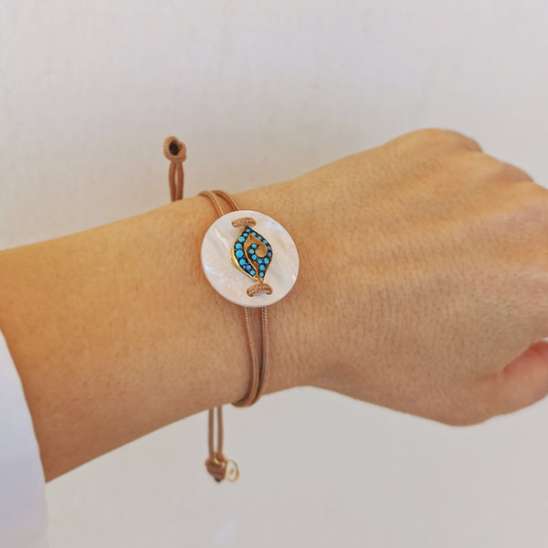 Evil Eye Bracelet handmade with mother of pearl gemstone and Turquoise zircons !