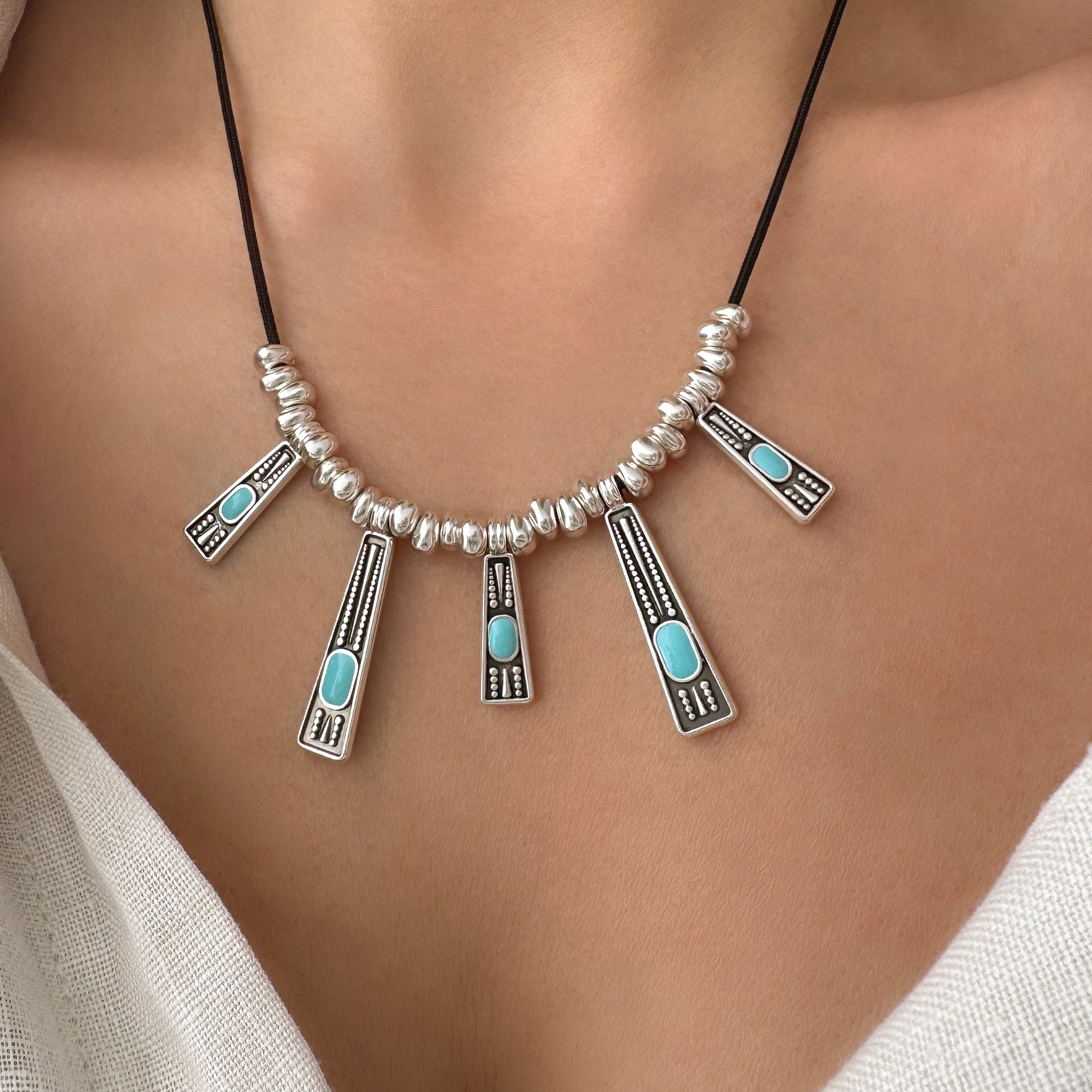 Turquoise Geometric Multi Charm Necklace in antique Silver