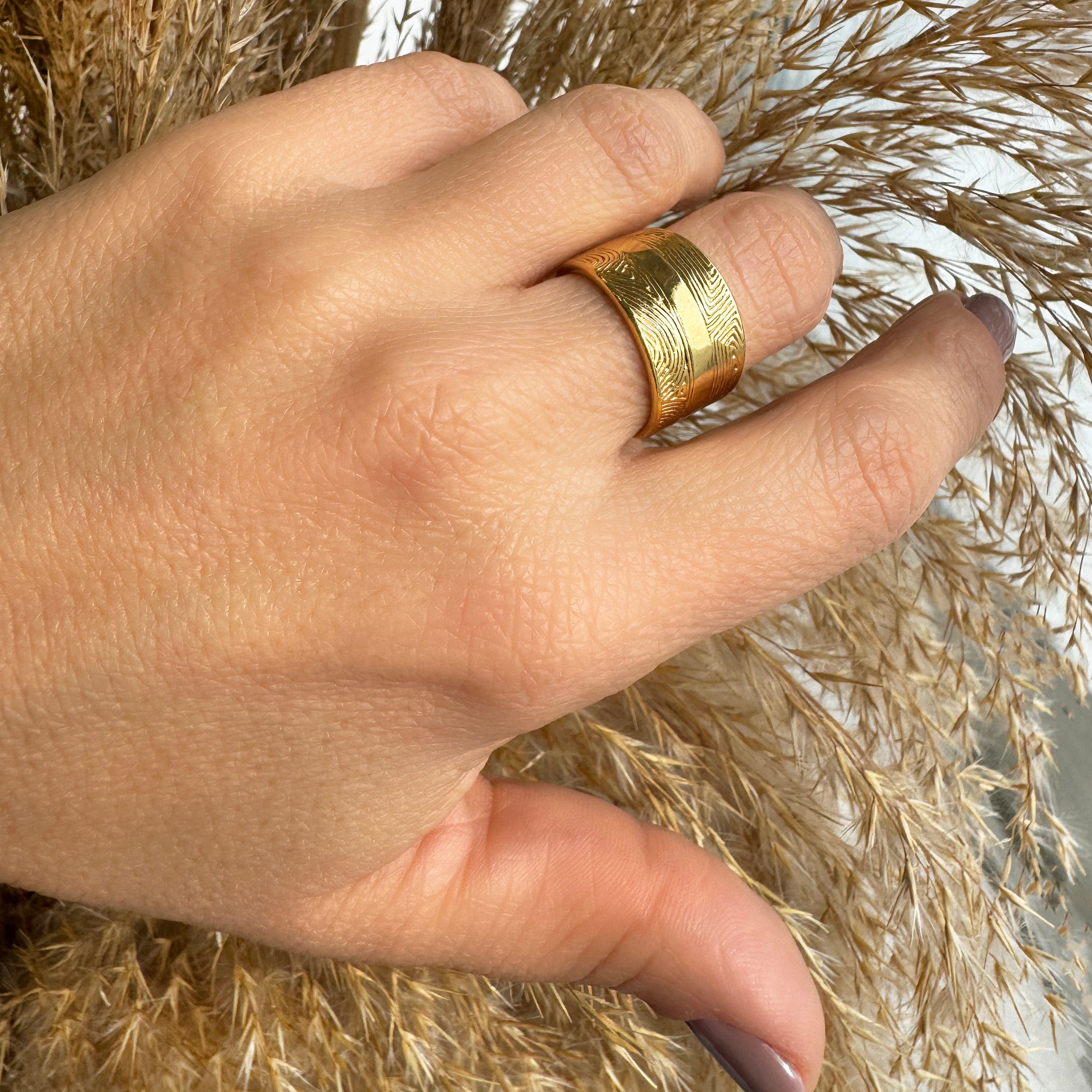Chunky gold cigar ring