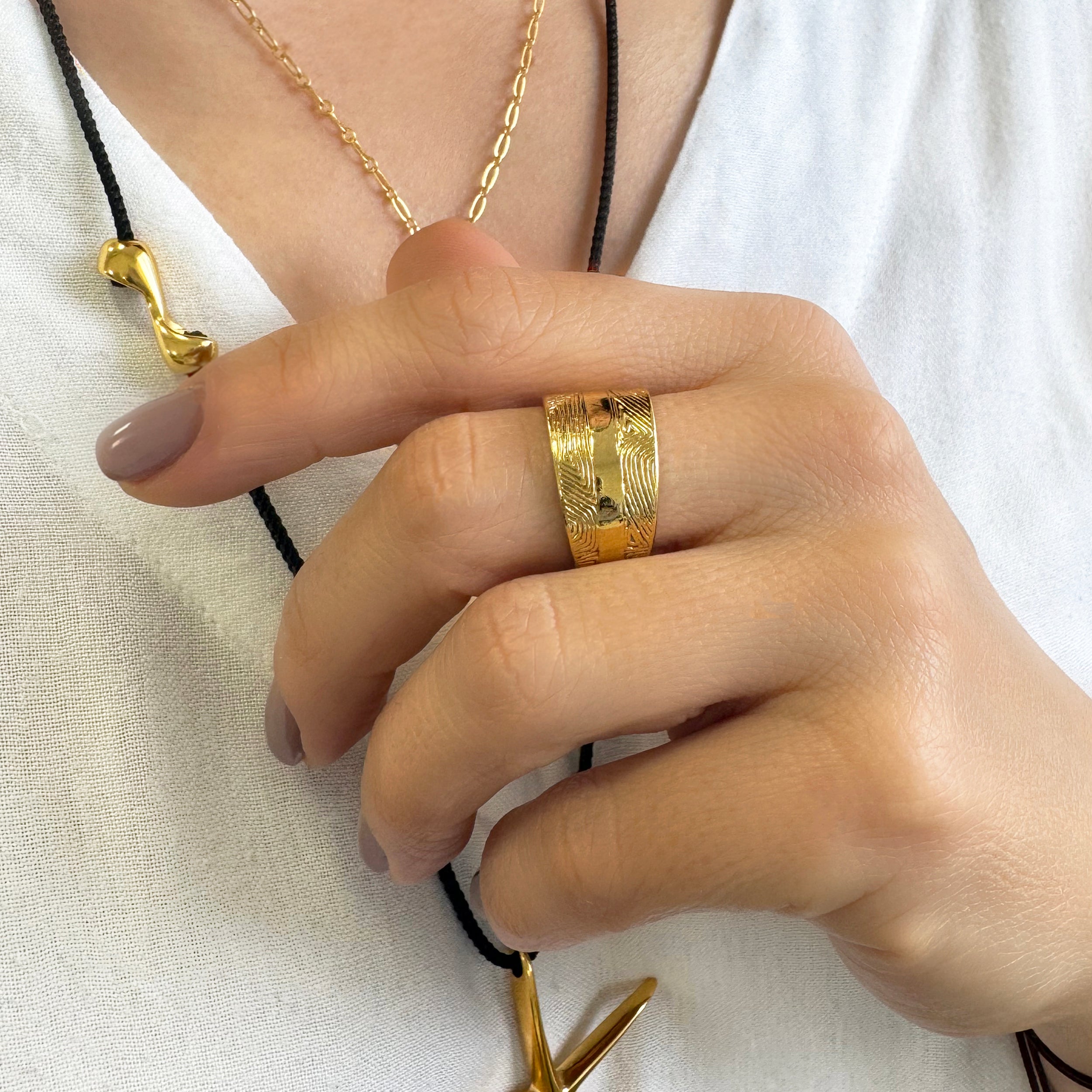 Chunky gold cigar ring
