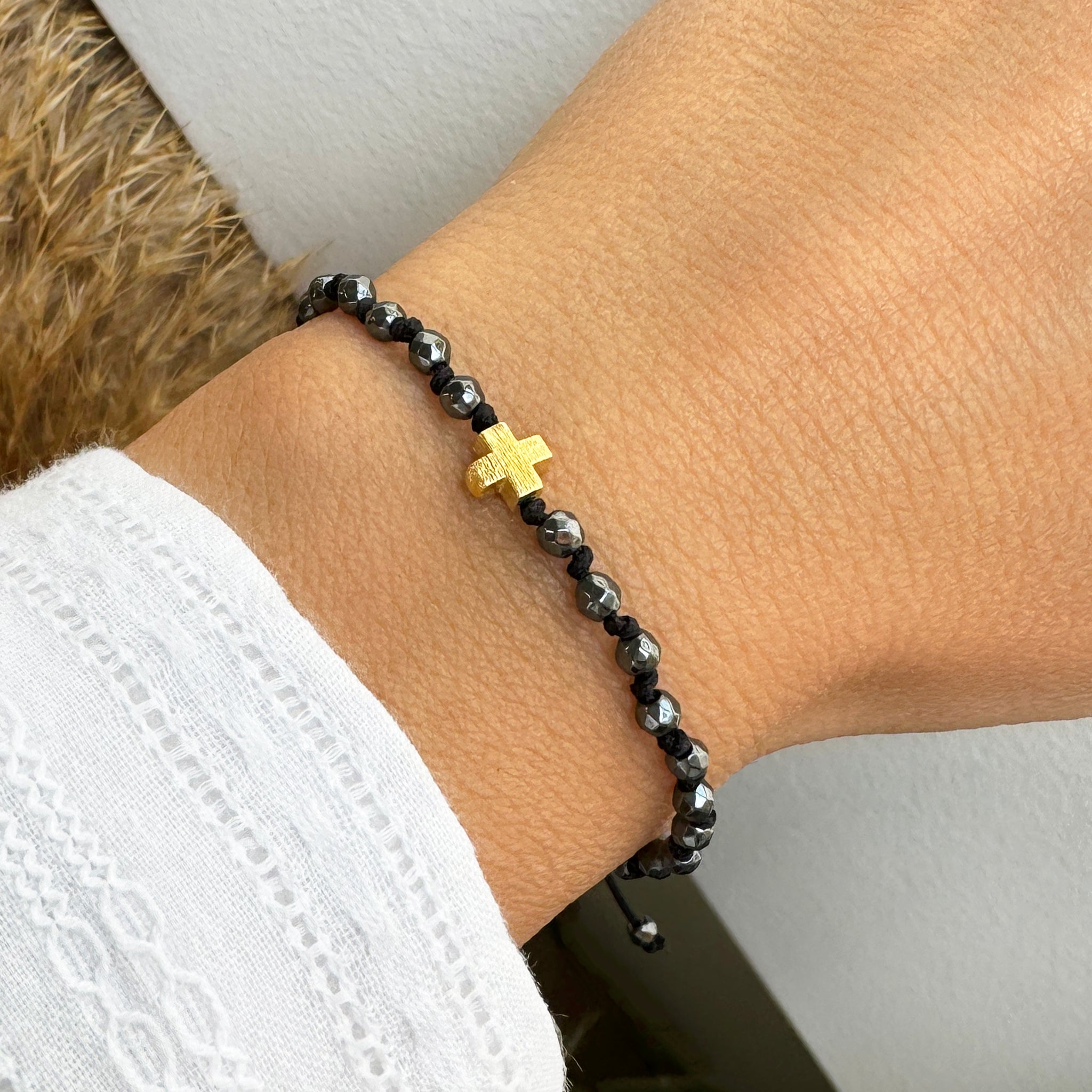 Gold Cross Bracelet with hematite gemstone and Good Luck Knots