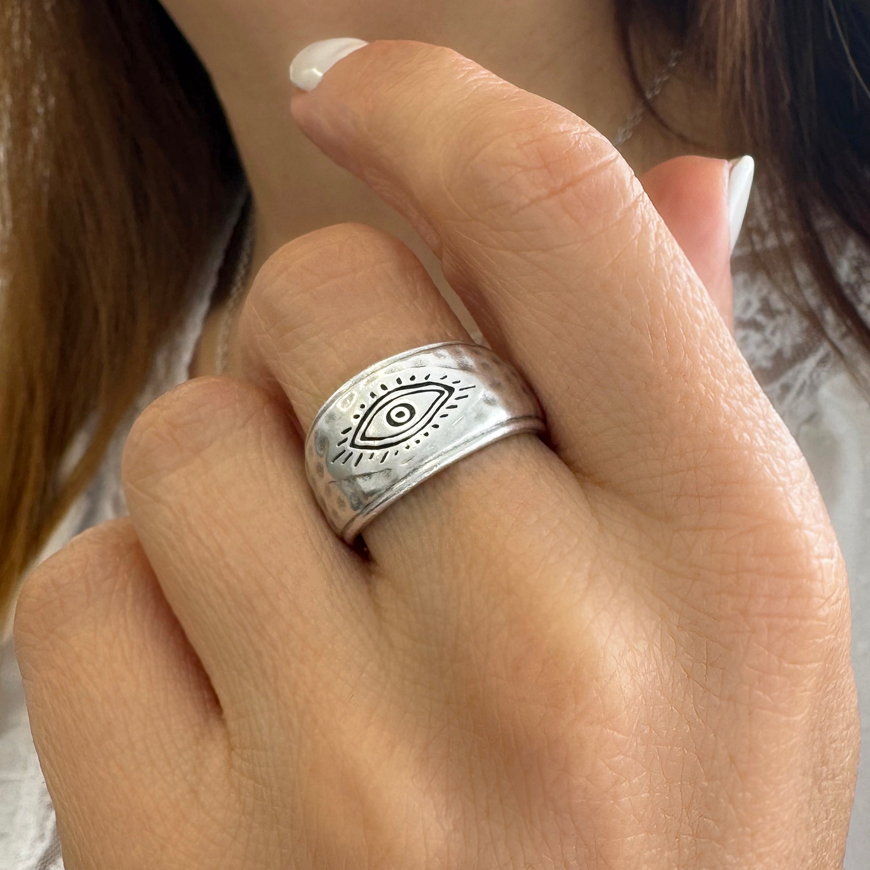 Silver ethnic evil eye ring