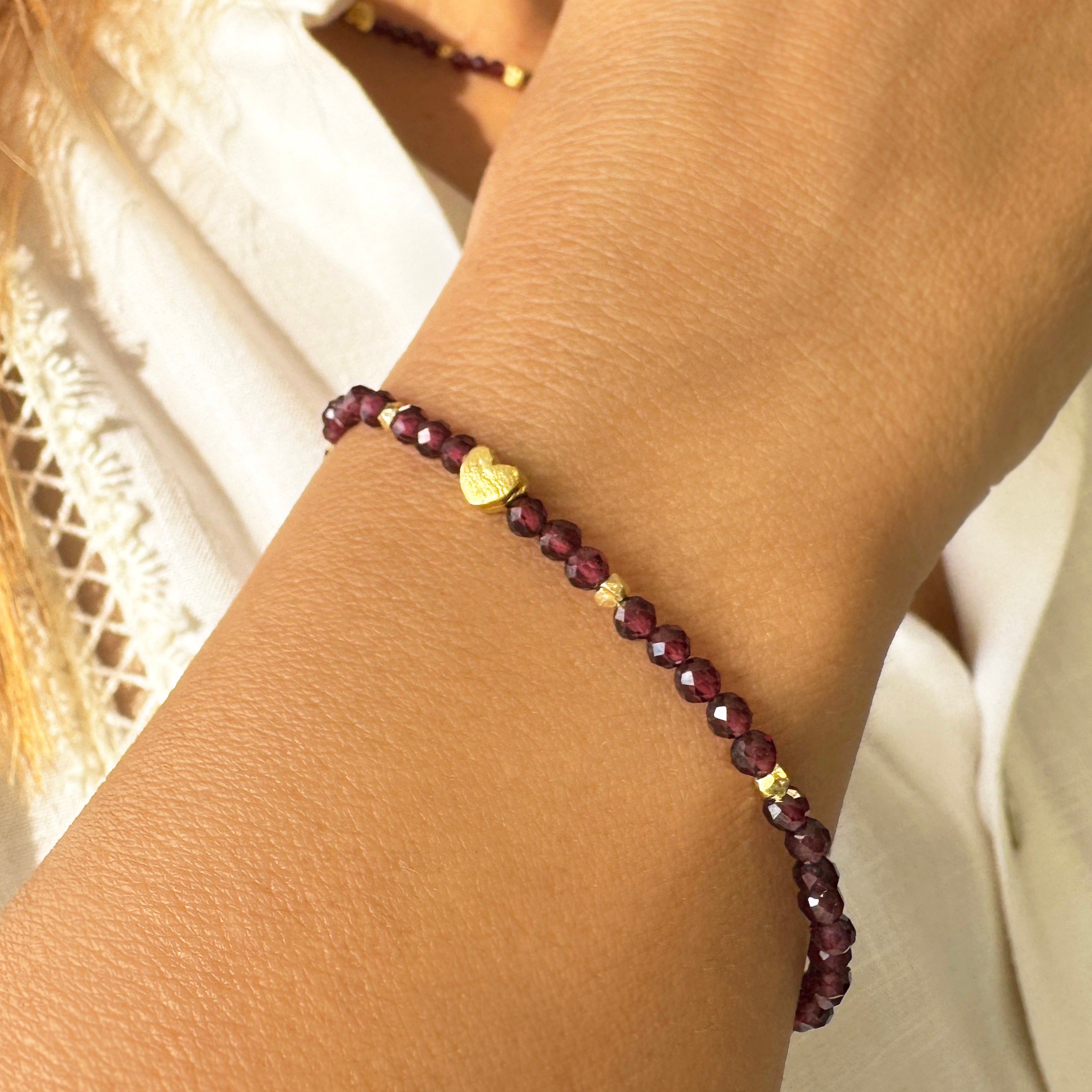 Red Garnet crystal bracelet with a tiny gold heart