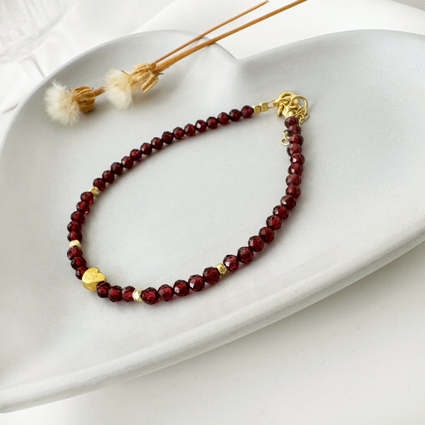 Red Garnet crystal bracelet with a tiny gold heart