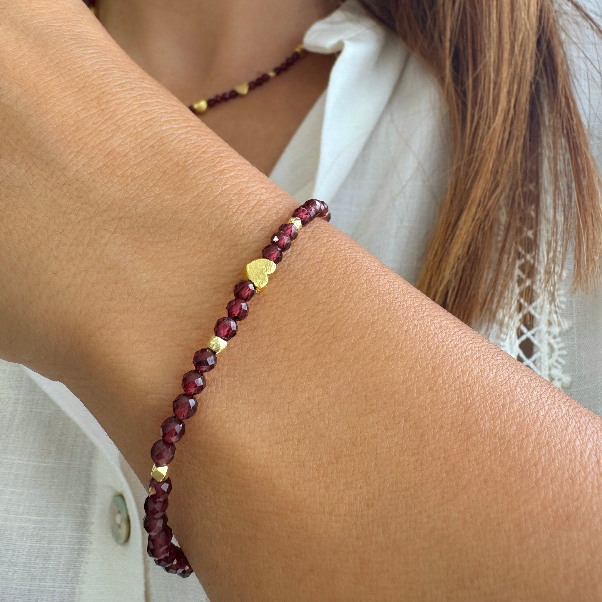 Red Garnet crystal bracelet with a tiny gold heart