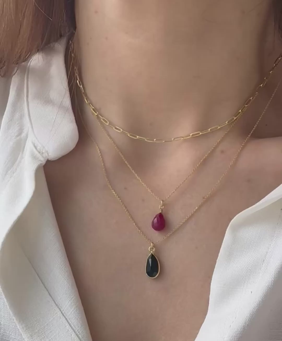 Load video: Tiny ruby drop pendant. Silver 925
