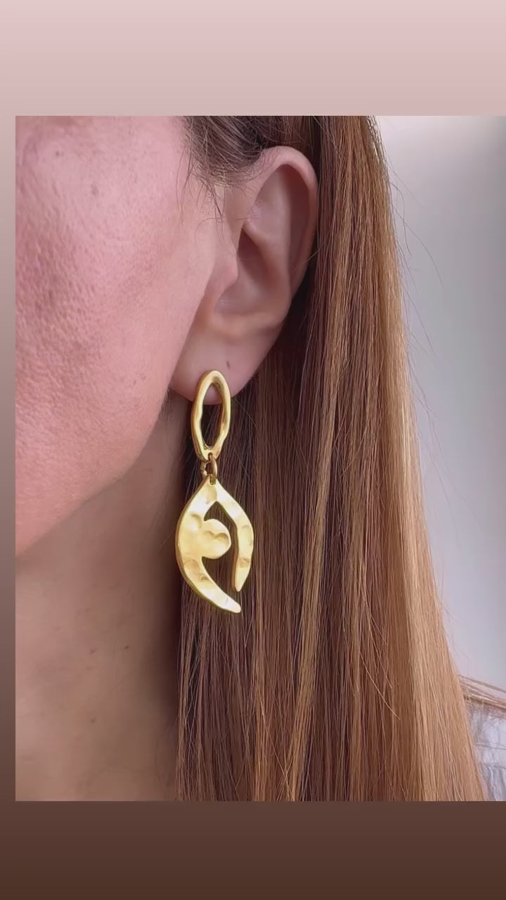 Load video: Long Gold Evil Eye Dangle Earrings