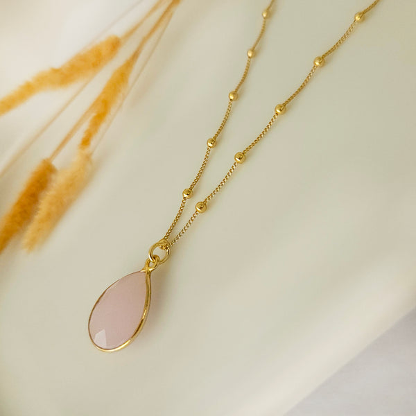 Rose quartz crystal necklace on satellite chain