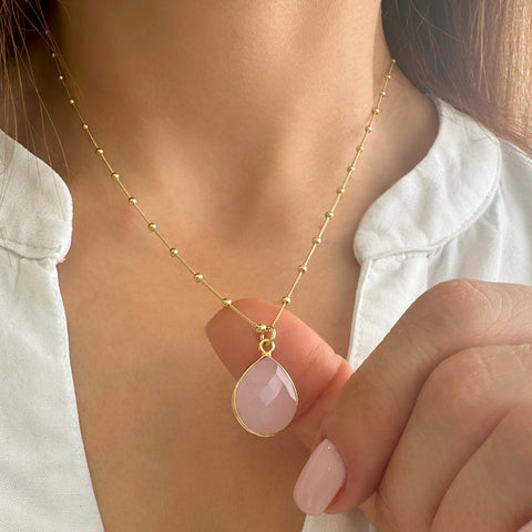 Rose quartz crystal necklace on satellite chain