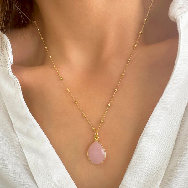 Rose quartz crystal necklace on satellite chain