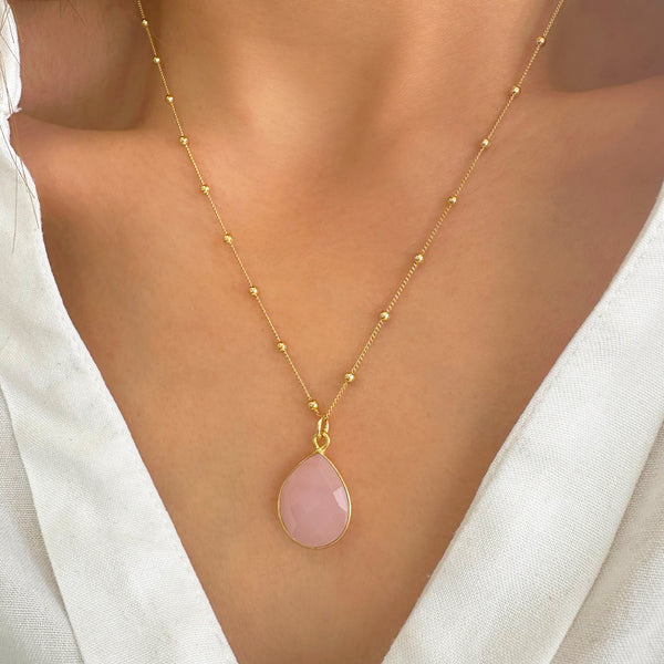 Rose quartz crystal necklace on satellite chain