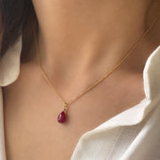 Tiny ruby drop pendant. Silver 925
