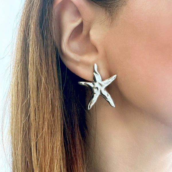 Silver starfish studs,