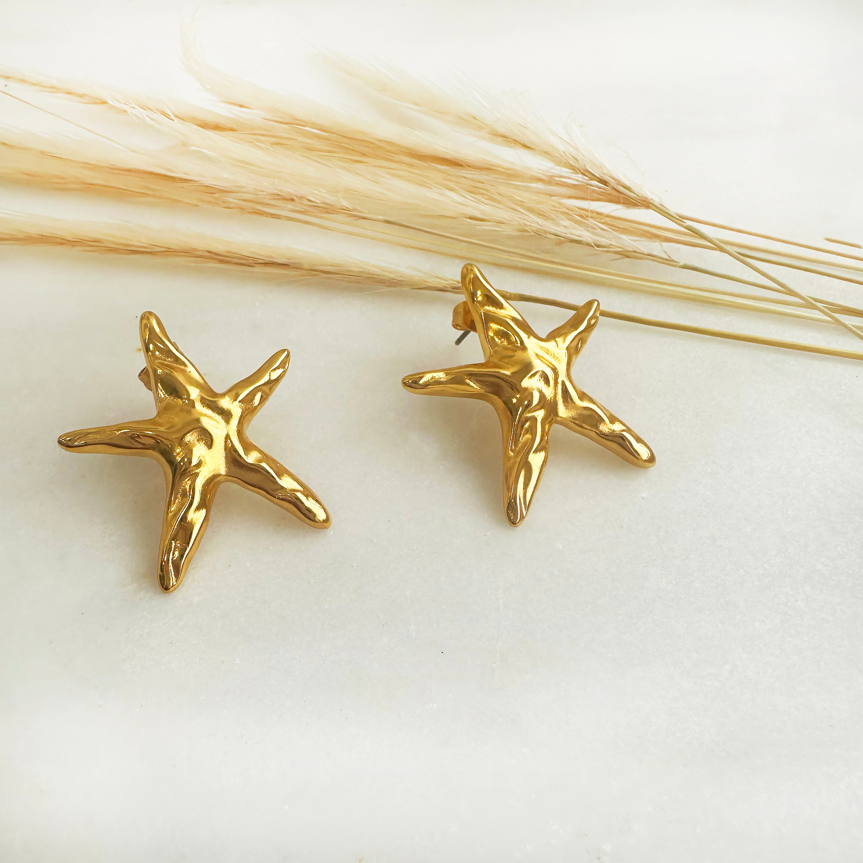 Silver starfish studs