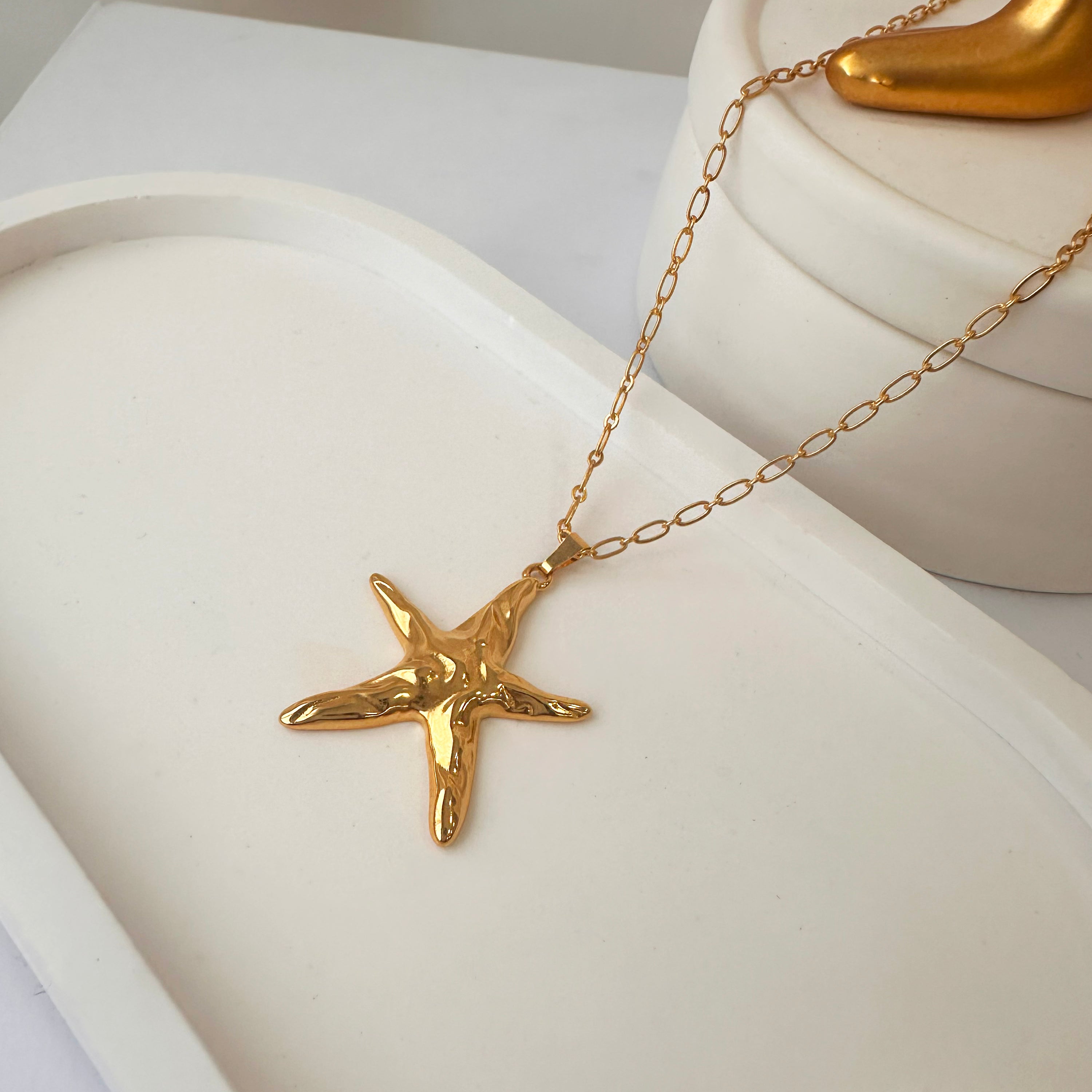 Gold starfish necklace