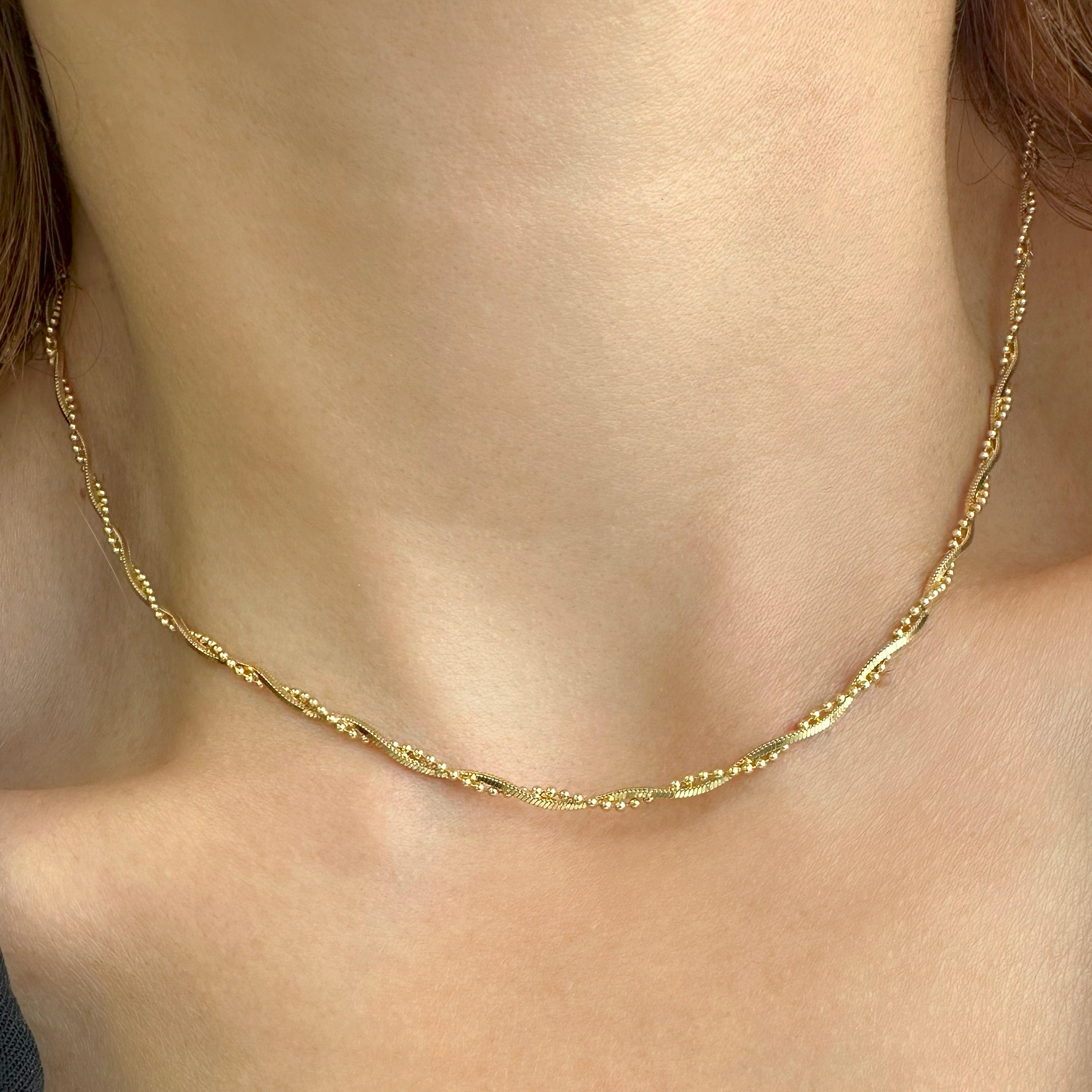 Twisted chain choker