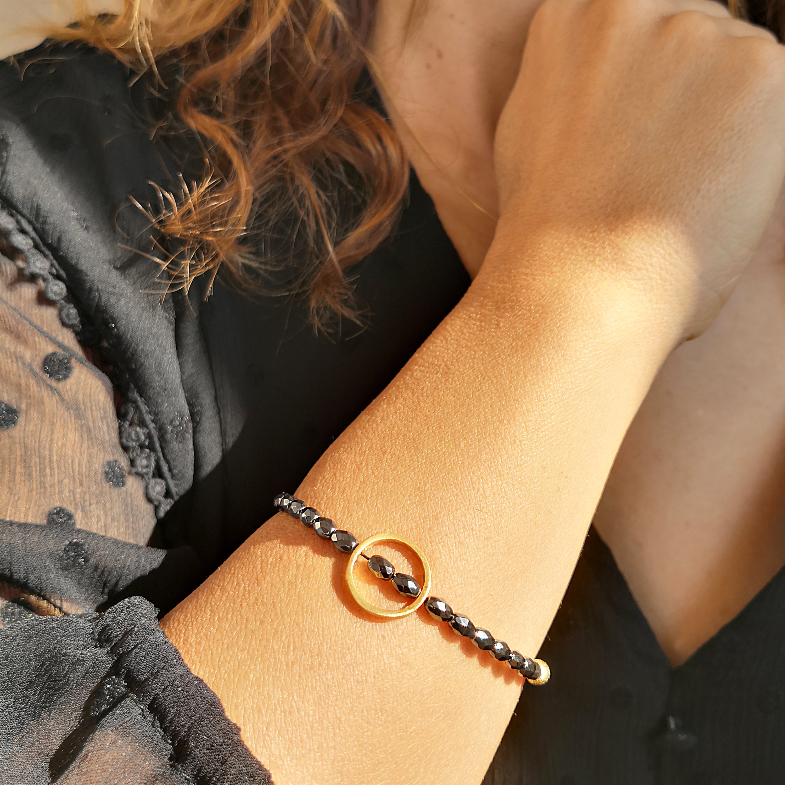 Dainty Boho Hematite Bracelet with a gold circle