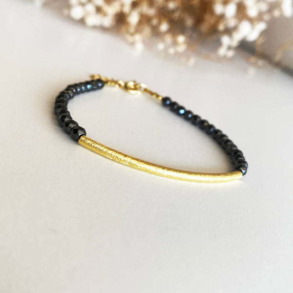 Hematite beads and gold bar bracelet