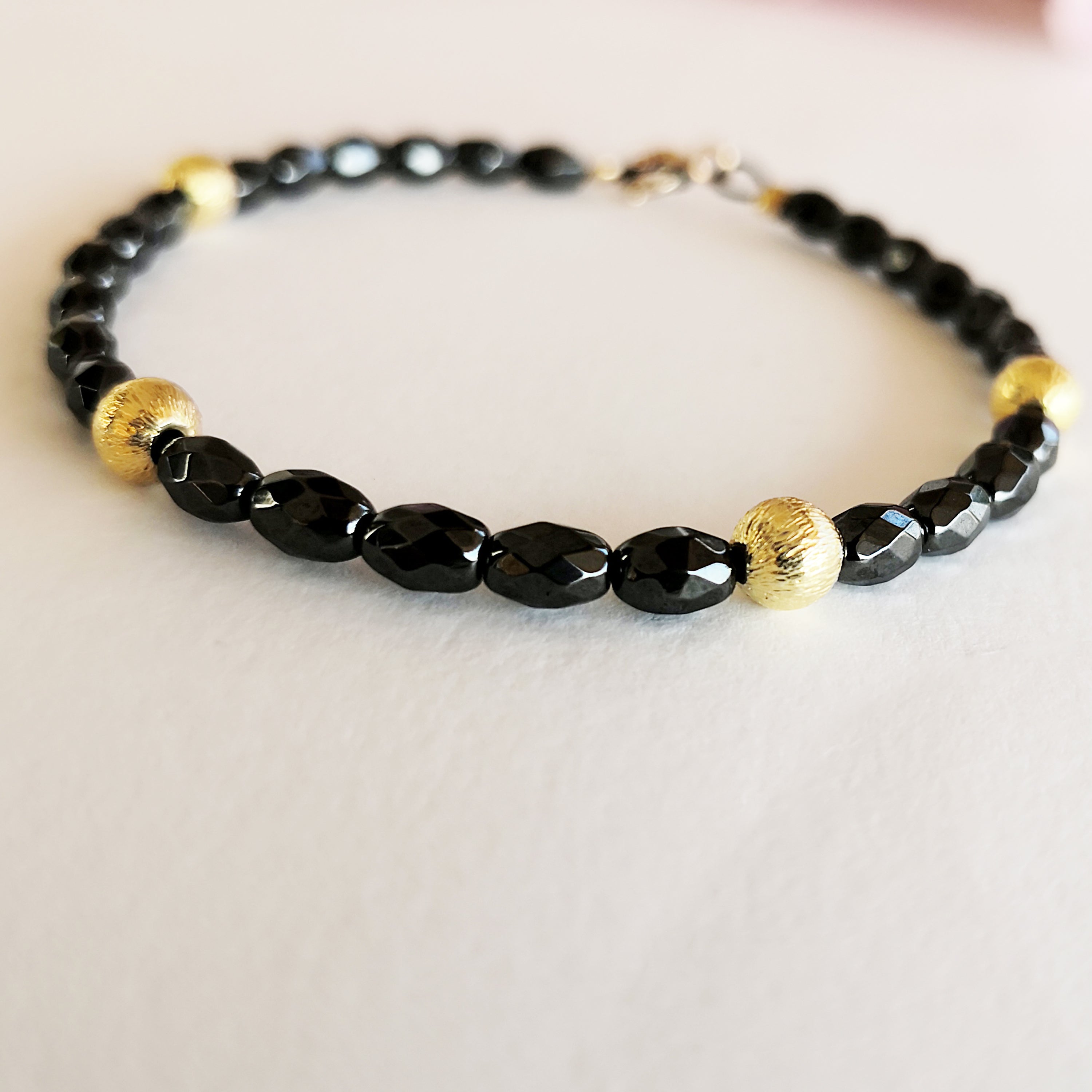 Dainty Boho Hematite Bracelet with gold beads