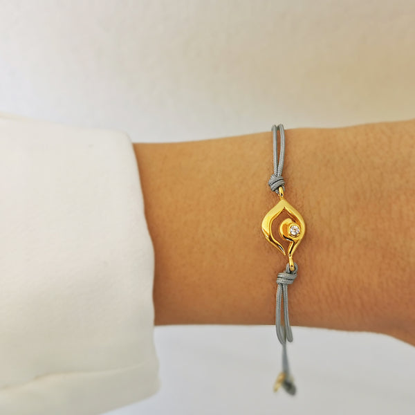 Protection Bracelet with a Gold Evil Eye pendant with a zircon