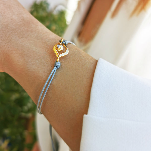 Protection Bracelet with a Gold Evil Eye pendant with a zircon