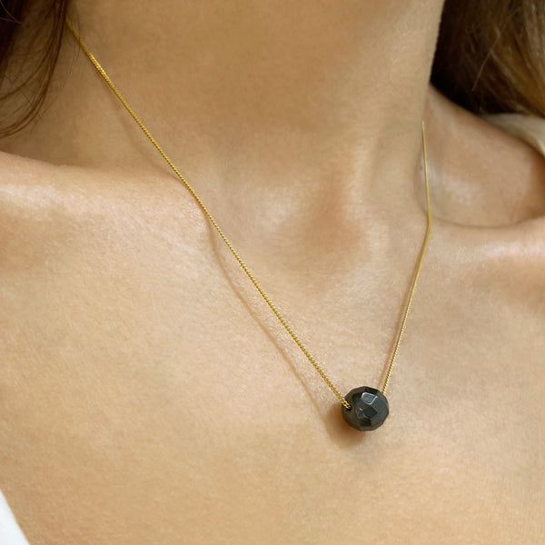 Fidget necklace with a hematite sphere pendant. Silver 925