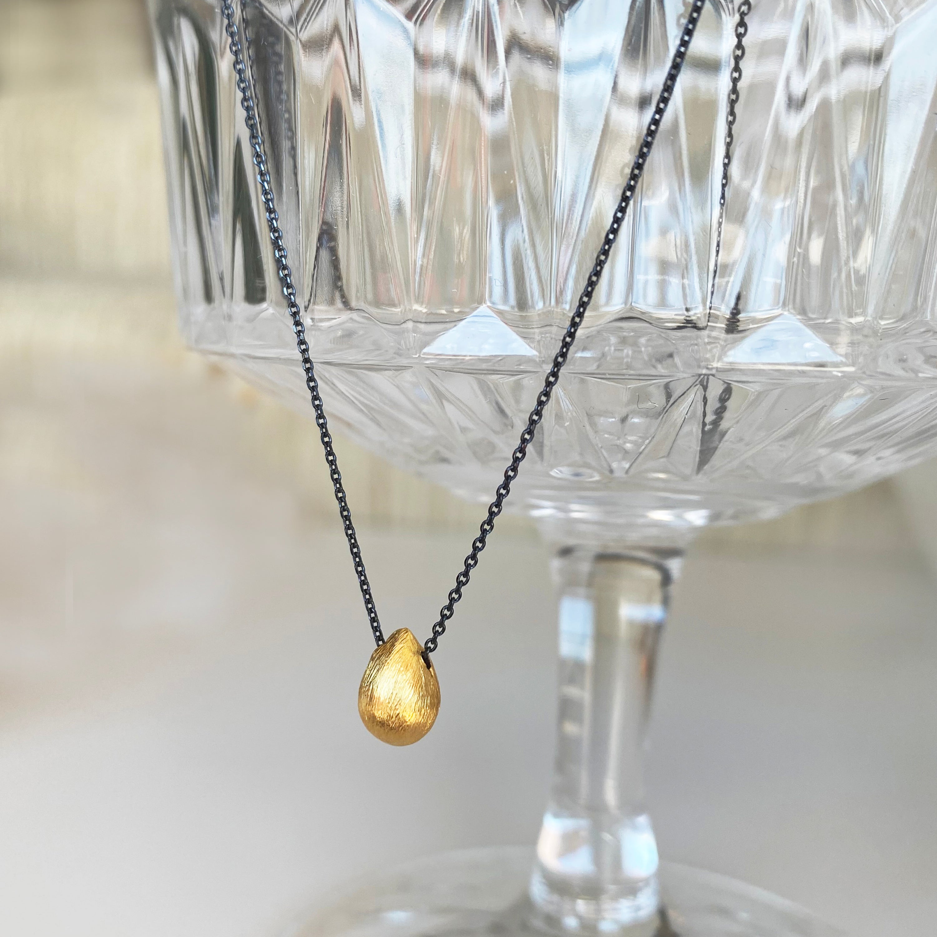 Waterdrop necklace with a tiny gold drop pendant! Sterling silver 925