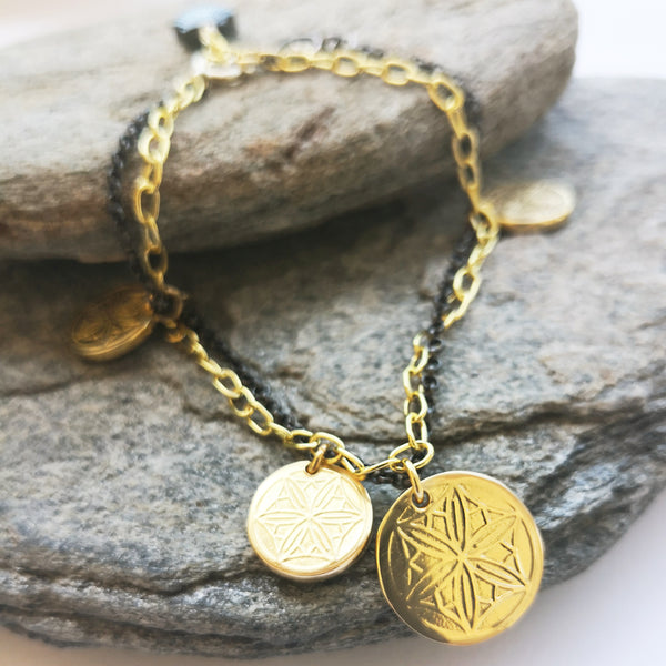 Gold Coin Bracelet with greek coins and hematite gemstone in a shell