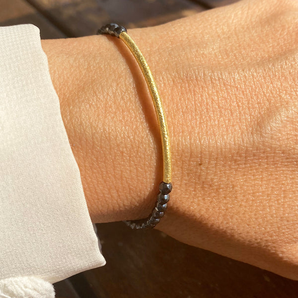 Hematite beads and gold bar bracelet