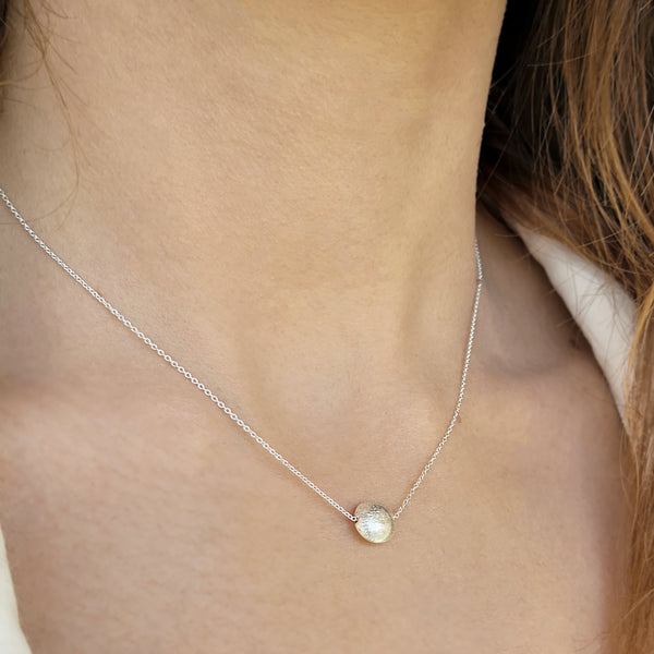 Minimalist Necklace with a shiny silver sphere pendant