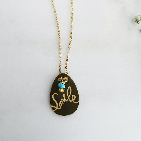 Dainty Boho Necklace with the word smile engraved !