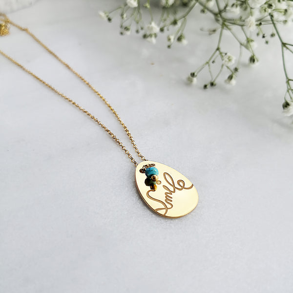 Dainty Boho Necklace with the word smile engraved !