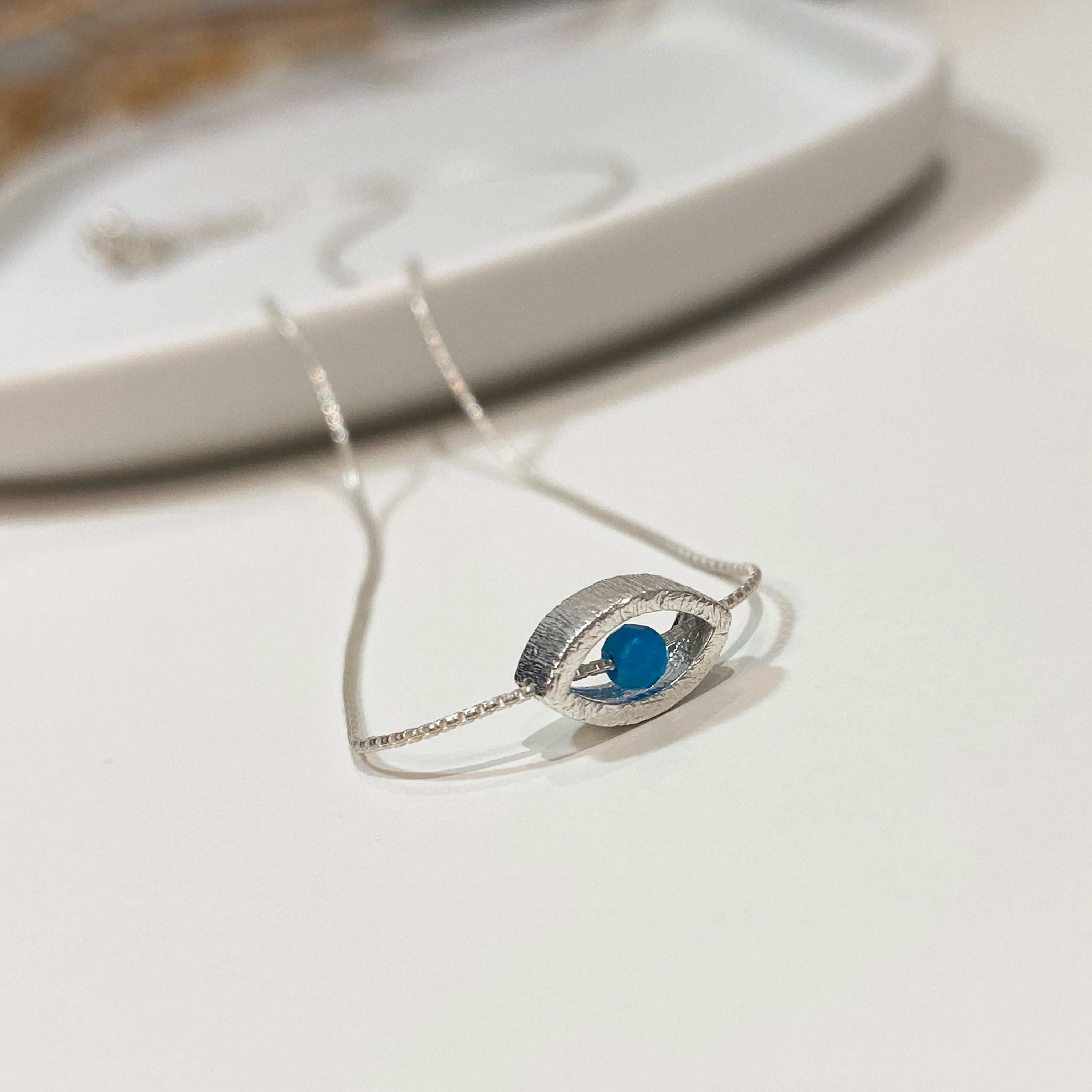 Evil Eye Necklace with a turquoise Howlite Pendant, Sterling Silver 925