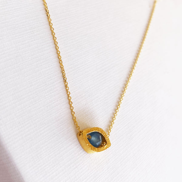 Evil Eye Necklace with a blue sapphire gemstone. Silver 925